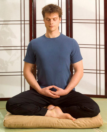 cross legged sitting posture for meditating